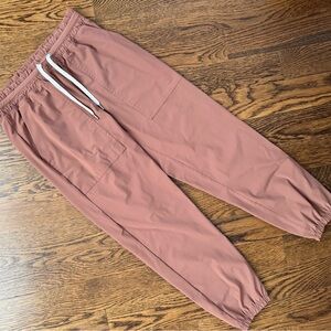 Vuori Women’s Jogger Wind Pants in Brick/Clay